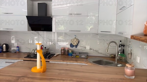 Interior of a modern kitchen with a sink and countertop