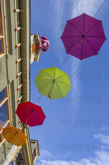 Colourful colourful umbrellas in the city centre, centre, jewellery, decorated, decoration, festive, umbrella, colourful, joyful, atmosphere, urban, design, hanging, hanging, travel, city trip, tourism, shopping, shopping, home, architecture, Dutch, creative, Deventer, Netherlands