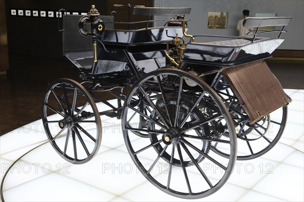 Motorised carriage by Gottlieb Daimler, the world's first four-wheeled automobile, Mercedes-Benz Museum, Stuttgart, Baden-Wuerttemberg, Germany, Europe