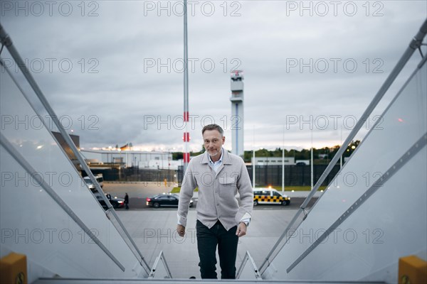 Christian Lindner (FDP), Federal Minister of Finance, pictured boarding an aircraft of the Bundeswehr air force. The Minister is travelling to the IMF Spring Meeting in Washington. Berlin, 16.04.2024. Photographed on behalf of the Federal Ministry of Finance (BMF)