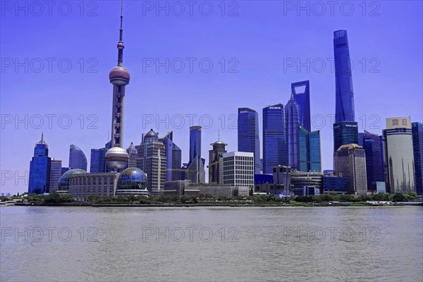 Stroll through Shanghai to the sights, Shanghai, China, Asia, The impressive skyline of Shanghai with a clear sky and the river in the foreground, Asia
