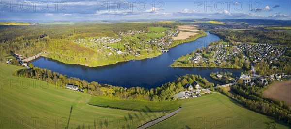 The Malter Dam is a dam built between 1908 and 1913 in the Free State of Saxony near the town of Malter, which impounds the middle reaches of the Rote Weisseritz. The dam is a curved gravity dam made of quarrystone masonry according to the Intze principle. The local road from Malter to Seifersdorf runs over the dam wall, Malter, Saxony, Germany, Europe