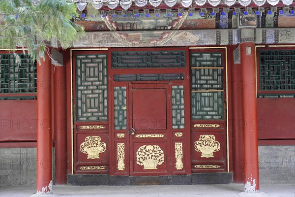 New Summer Palace, Beijing, China, Asia, Traditionally decorated red door in Chinese style, symbol of culture and architecture, Beijing, Asia