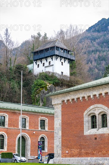Observation tower on a hill with a rear building and surrounding nature, Bad Reichenhall, Bavaria, Germany, Europe