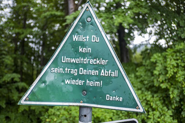 Keeping the environment clean, message to polluters and cyclists on a sign at the upper entrance to the Eistobel, in the nature reserve of the same name near Gruenenbach in Westallgaeu, Bavaria, Germany, Europe