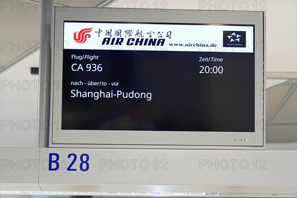 Flight CA 936 Frankfurt, Shanghai China, Digital flight information board showing information about a flight to Shanghai-Pudong, Shanghai, China, Asia