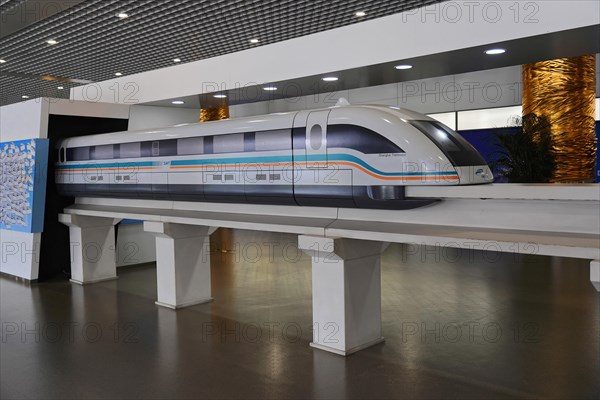 Shanghai Transrapid Maglev Shanghai Maglev Train Station Station, Shanghai, China, Asia, Model of a Maglev train on exhibition display in a modern environment, Asia