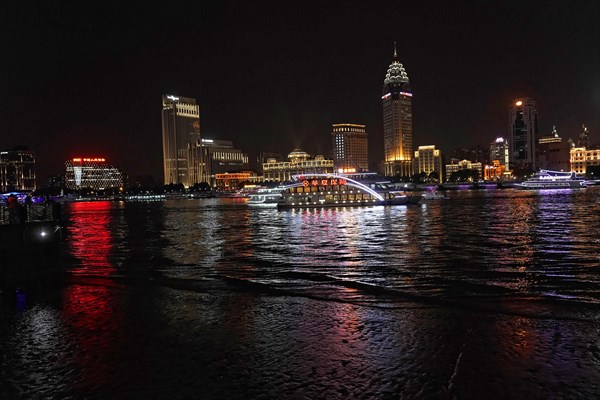 Skyline of Shanghai at night, China, Asia, Illuminated buildings and reflections on the water on a city night, Shanghai, People's Republic of China, Asia