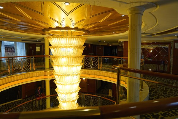 Cruise ship on the Yangtze River, Yichang, Hubei Province, China, Asia, An impressive chandelier above the opulent staircase of a cruise ship, Shanghai, Asia