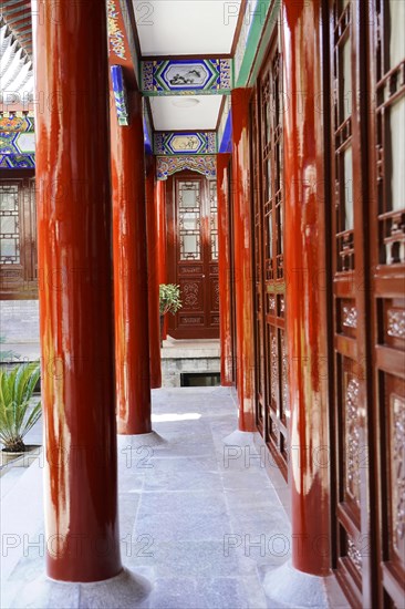 Chongqing, Chongqing Province, China, Asia, corridor between red columns of traditional Chinese architecture, Asia