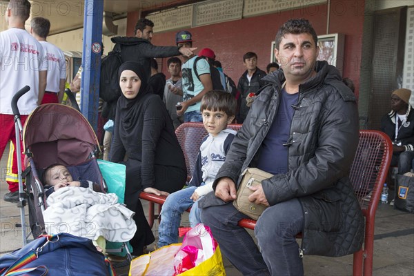 Syrian refugees have arrived at Schoenefeld station on a special train. They are then taken by bus to accommodation in Berlin, 13/09/2015, Schoenefeld, Brandenburg, Germany, Europe