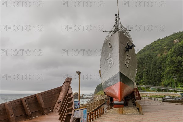 The bow of a wooden boat and exterior of South Korean battleship on display in Unification Park in Gangneung, South Korea, Asia