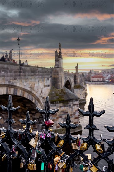 Charles Bridge, figures, place for lovers, fence, bicycle locks, Vltava, Prague, Czech Republic, Europe