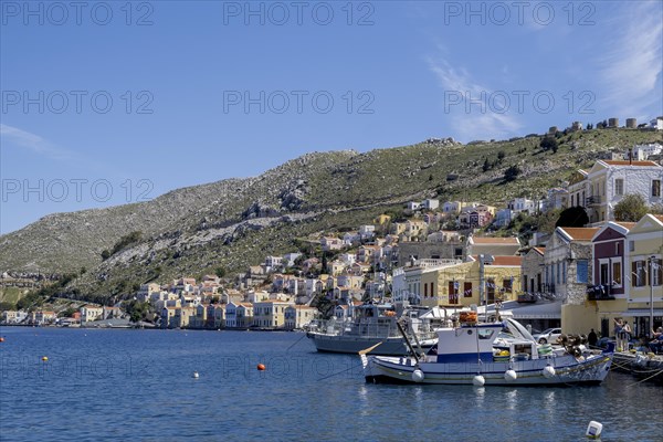 Boats in the harbour of Symi town, Symi island, Dodecanese, Greek islands, Greece, Europe