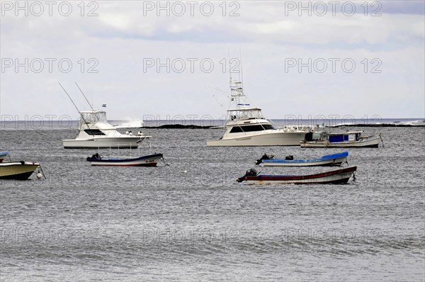 San Juan del Sur, Nicaragua, Several boats on the sea under a cloudy sky, Central America, Central America