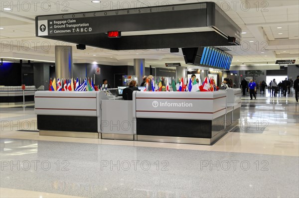 AUGUSTO C. SANDINO Airport, Managua, Nicaragua, Information stand with flags and employees at an airport, Central America, Central America