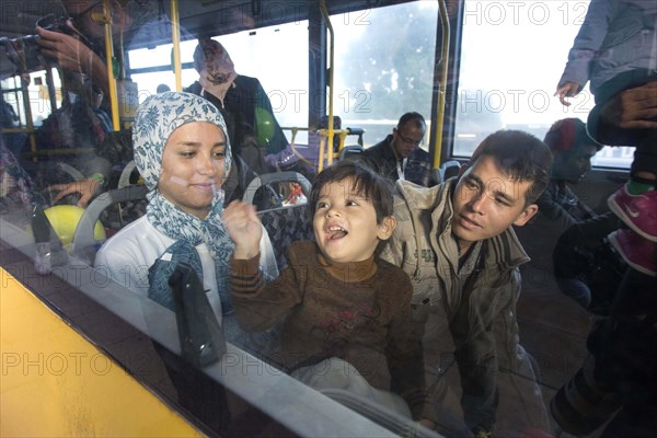 Syrian refugees have arrived at Schoenefeld station on a special train. They are then taken by bus to accommodation in Berlin, 13/09/2015, Schoenefeld, Brandenburg, Germany, Europe