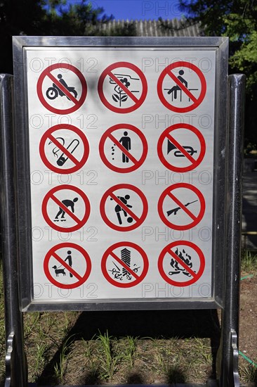 New Summer Palace, Beijing, Beijing, China, Asia, Various prohibition signs with crossed out activities on a sign, Asia