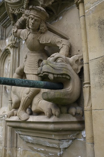 Dragon slayer motif on the fish fountain, fountain, market fountain, old town, market square, Schwaebisch Hall, Hohenlohe, Heilbronn-Franken, Baden-Wuerttemberg, Germany, Europe