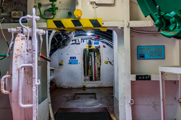 Iron doorway and interior of aft section of submarine on display at Unification Park in Gangneung, South Korea, Asia