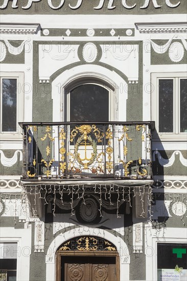 Old, decorated balcony at the old pharmacy on Marienplatz, district of Garmisch, Garmisch-Partenkirchen, Werdenfelser Land, Upper Bavaria, Bavaria, Germany, Europe