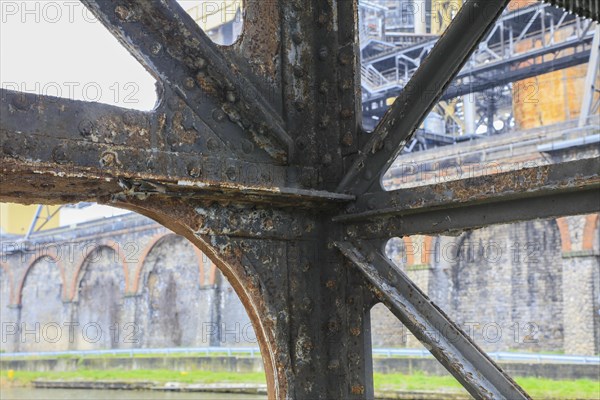 Rusty iron construction of a bridge, Solvay chemical plant for the production of bicarbonate and carbonate of soda or sodium carbonate, Dombasle-sur-Meurthe, department of Meurthe-et-Moselle, Lorraine, Grand Est region, France, Europe