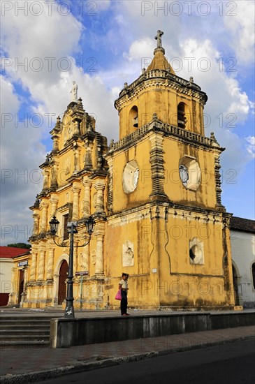 Church La Recoleccion, 1786, Leon, Nicaragua, Baroque church facade in warm sunlight, Baroque church with yellow facade under a blue sky, Central America, Central America