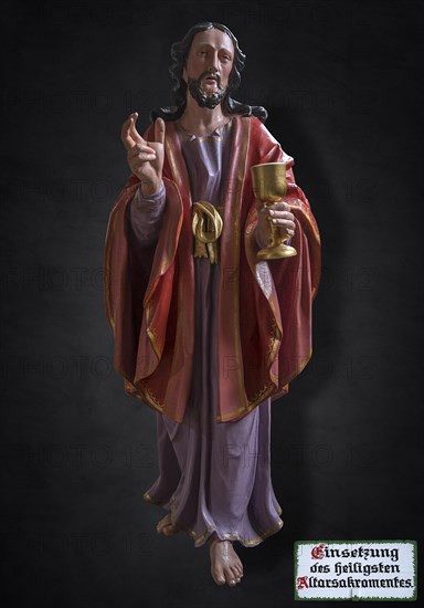Life-size, carved Jesus figure, Last Supper figure, 350-year-old processional figure on a dark background, Neunkirchen am Brand, Middle Franconia, Bavaria, Germany, Europe