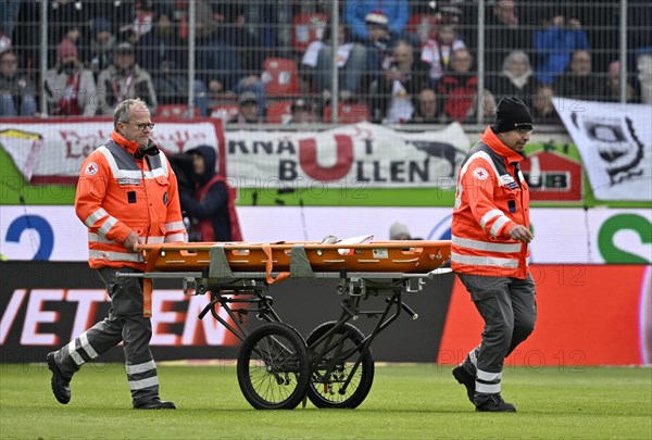 Injury, paramedic, Deurtsches Rotes Kreuz with mobile stretcher on the pitch, Voith Arena, Heidenheim, Baden-Wuerttemberg, Germany, Europe