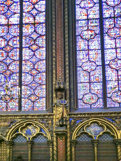 Paris 1er arr. The Holy Chapel (Sainte Chapelle) built on the Ile de la Cite at the request of Saint Louis, Apostle statue. Ile de France. France