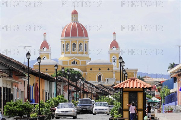 Cathedral Nuestra Senora de la Asuncion, Old Town, Granada, Nicaragua, A majestic cathedral with yellow domes towers over the neighbouring buildings, Central America, Central America