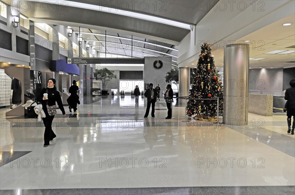 AUGUSTO C. SANDINO Airport, Managua, Nicaragua, Spacious lobby of an airport with a Christmas tree and a wall clock, Central America, Central America