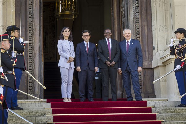 Annalena Baerbock (Alliance 90/The Greens), Federal Foreign Minister, takes a photo during her participation in the international humanitarian conference on Sudan and its neighbouring countries. Here with Stephane Sejourne (2nd from left), Foreign Minister of France, Josep Borrell (R), High Representative of the EU for Foreign Affairs and Security Policy, and the Foreign Minister of South Sudan, James Pitia Morgan. 'Photographed on behalf of the Federal Foreign Office'