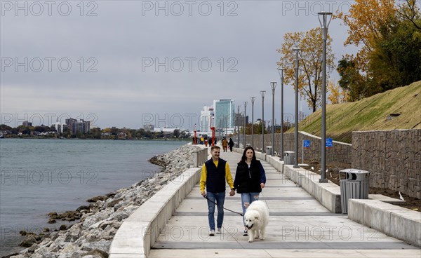 Detroit, Michigan, People walking on the Detroit Riverwalk, on the site of the old Uniroyal tire plant