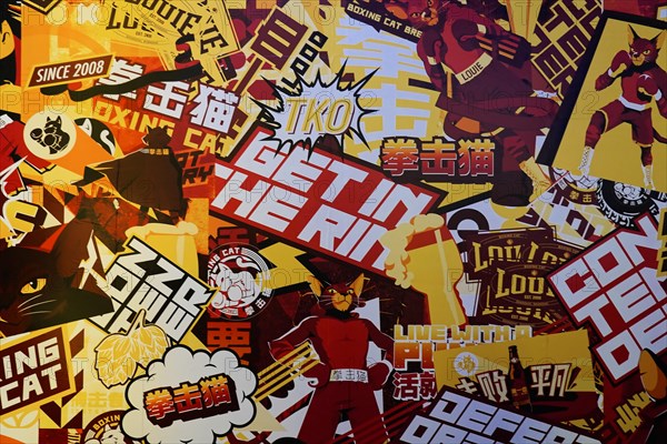 Evening stroll through Shanghai to the sights, Shanghai, Wall collage with various colourful posters and lettering, reflecting contemporary pop culture, Shanghai, People's Republic of China