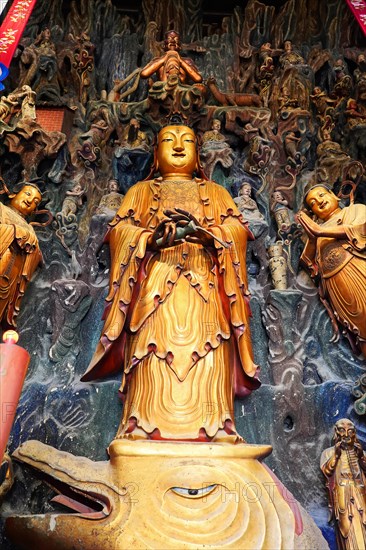 Jade Buddha Temple, Buddha, Puxi, Shanghai, Shanghai Shi, China, Expressive golden Buddha statue in front of detailed background, Shanghai, People's Republic of China, Asia