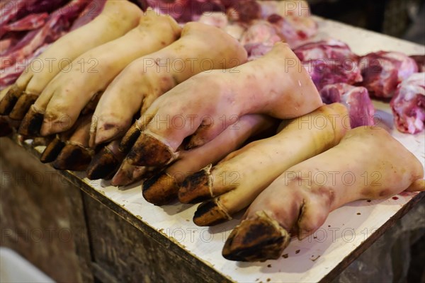 Chongqing, Chongqing Province, China, Pigs' feet neatly draped on a market stall, Chongqing, Chongqing Province, China, Asia