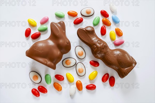 Easter, symbol photo, Easter bunny made of chocolate and colourful Easter eggs, text free space, Germany, Europe