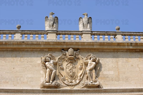 Coat of arms of Pope Paul V on the facade, Hotel des Monnaies, Avignon, Vaucluse, Provence-Alpes-Cote d'Azur, South of France, France, Europe