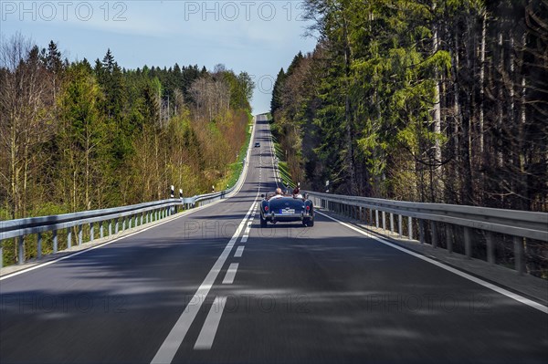 Country road near Boerwang with an old MG sports car, Allgaeu, Swabia, Bavaria, Germany, Europe