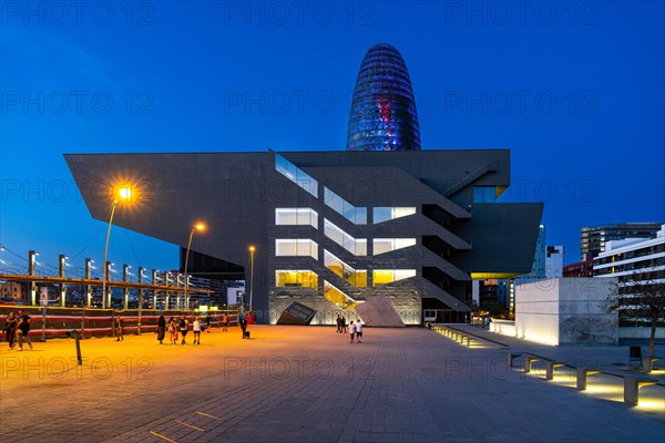 The Torre Glories office building and the Disseny Hub museum at blue hour n Barcelona, Spain, Europe