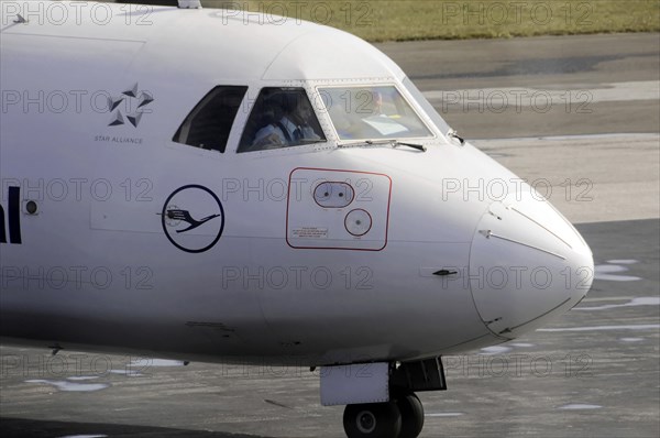 Sylt Airport, Sylt, North Frisian Island, Schleswig-Holstein, close-up of the cockpit of a passenger aircraft at an airport, Sylt, North Frisian Island, Schleswig-Holstein, Germany, Europe