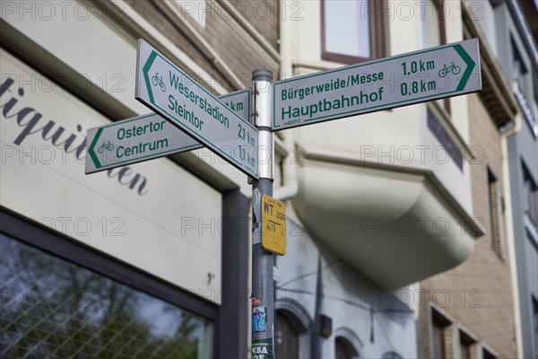 Signposts to Weserstadion, Steintor, Ostertor, Centrum, Buergerweise, Messe and central railway station in Bremen, Hanseatic City, State of Bremen, Germany, Europe