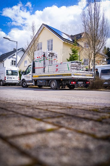 A delivery van with building materials is ready for work, solar systems construction, trade, Muehlacker, Enzkreis, Germany, Europe