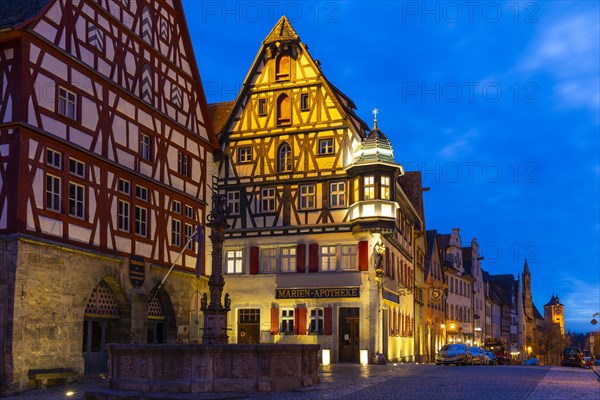 St George's Fountain in front of the Marienapotheke, Blue Hour, Rothenburg ob der Tauber, Middle Franconia, Bavaria, Germany, Europe
