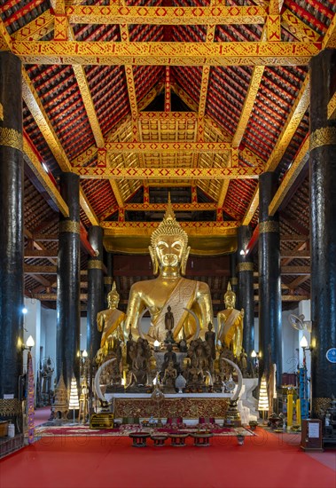 Collection of Buddha images at Wat Wisunarat temple, Luang Prabang, Laos, Asia