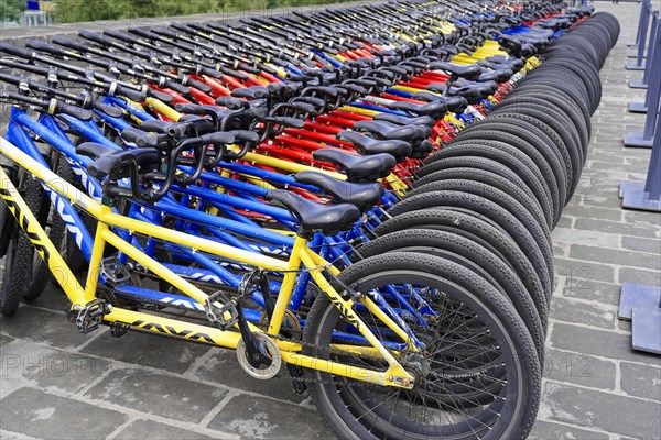 Rental bicycles, Xian, Shaanxi, China, AsiaArranged rows of bicycles in different colours for public use, Xian, Shaanxi Province, China, Asia