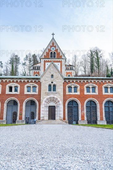 Symmetrical entrance area of a building with brick architecture and arched windows, Alte saltworks, Bad Reichenhall, Bavaria, Germany, Europe