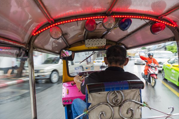 Ride a tuk tuk through the city, sightseeing, taxi, driving, speed, safety, road traffic, dangerous, travel, city trip, sightseeing, holiday, danger, culture, tourism, transport, fast, speeding, transport, traffic, movement, blurred, curve, vehicle, motorbike, capital, Bangkok, Thailand, Asia