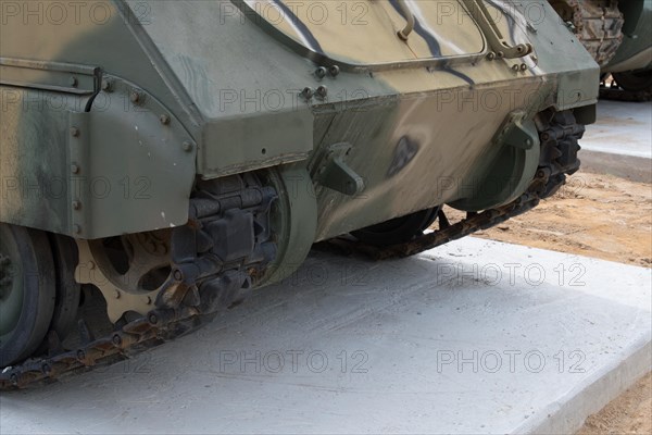 Tracks and lower portion of military vehicle used in Korean war on display in public park in Nonsan, South Korea, Asia